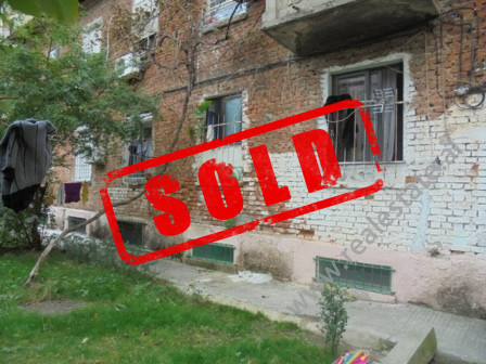 Apartment and store space for sale near Sulejman Delvina Street in Tirana (TRS-1014-58j)